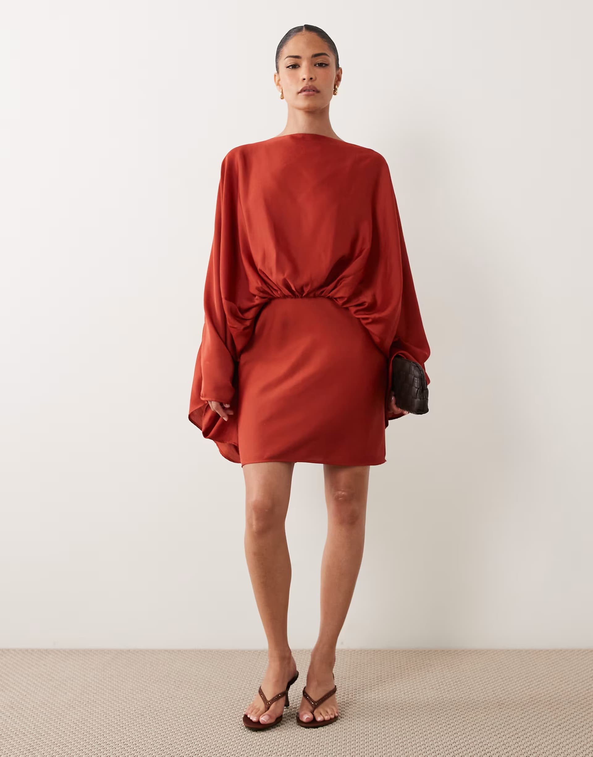 ASOS ASOS DESIGN Petite cape sleeve open back mini dress with tassels in rust