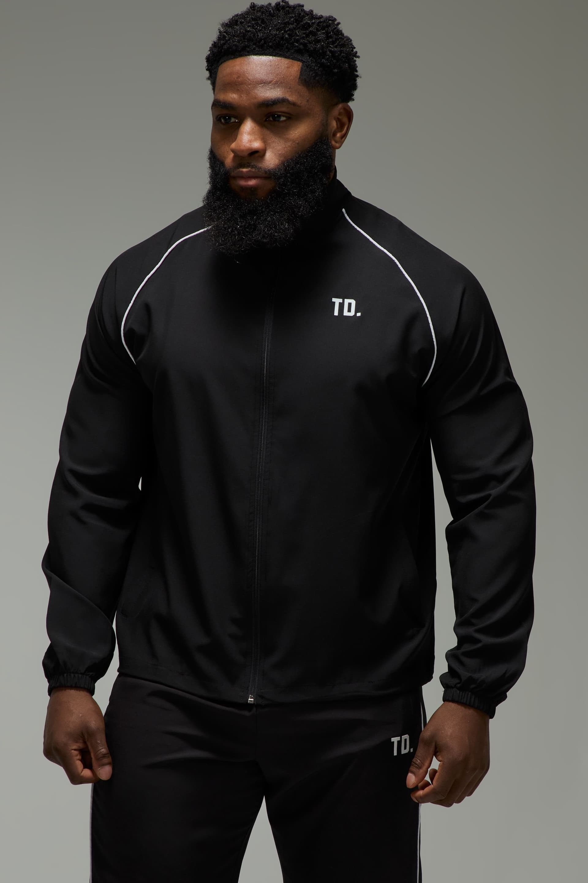 Training Dept. Training Dept. Men's Training Dept Woven Track Jacket in Black