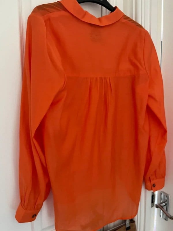 Never Fully Dressed Orange Miley Shirt Embroidered Logo Size 8
