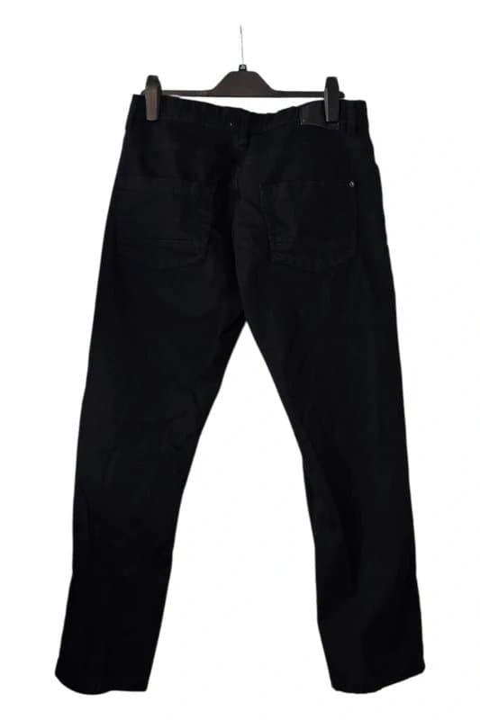 Kangaroo Poo Black jeans with a straight-leg fit.