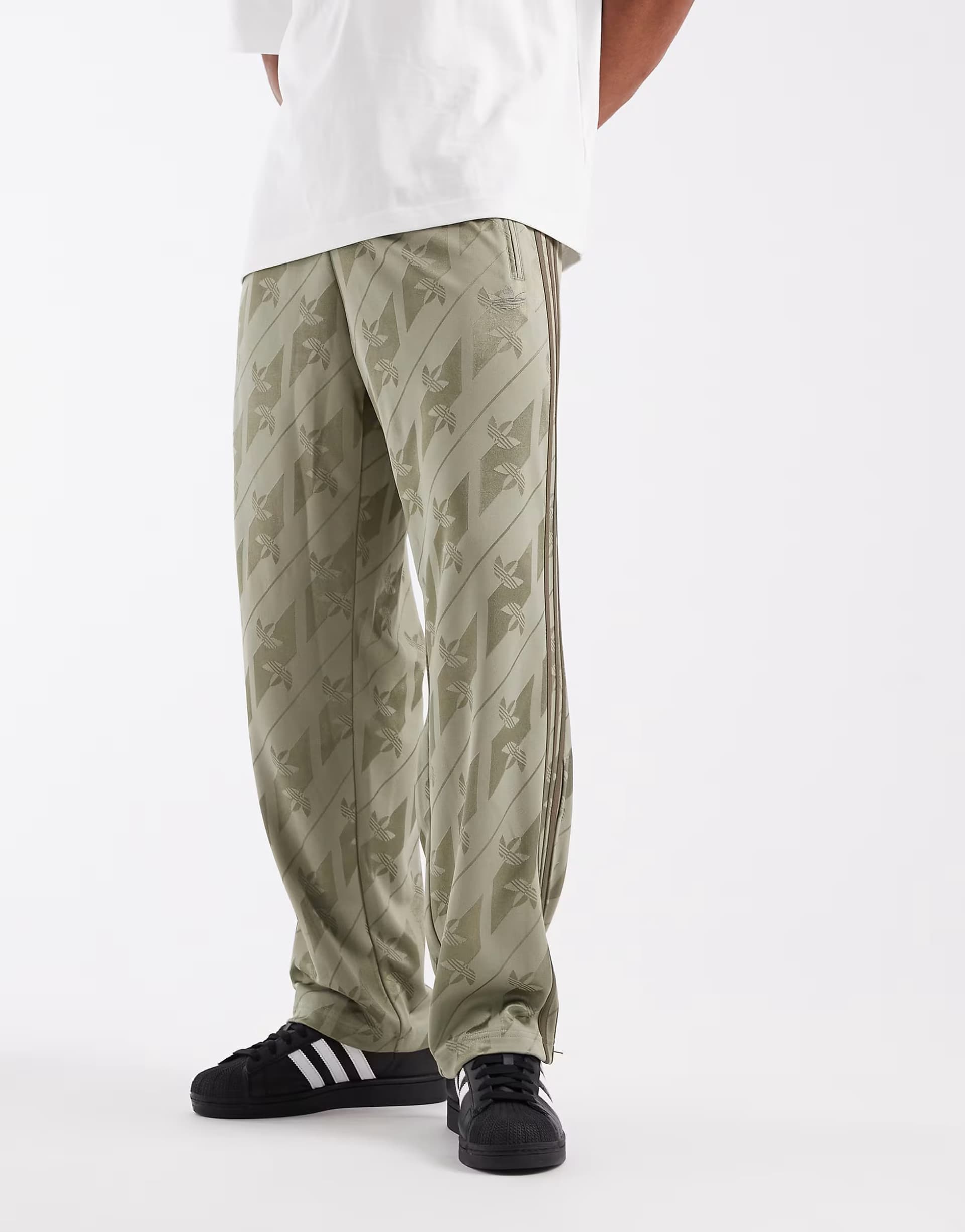 ASOS adidas Originals firebird track pants in khaki monogram