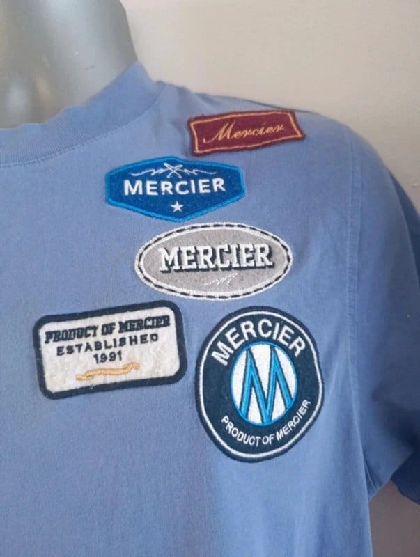 Mercier Mercier T Shirt Large Blue Badge Logo Patch Streetwear Graphic Tee Festival Summer - 1