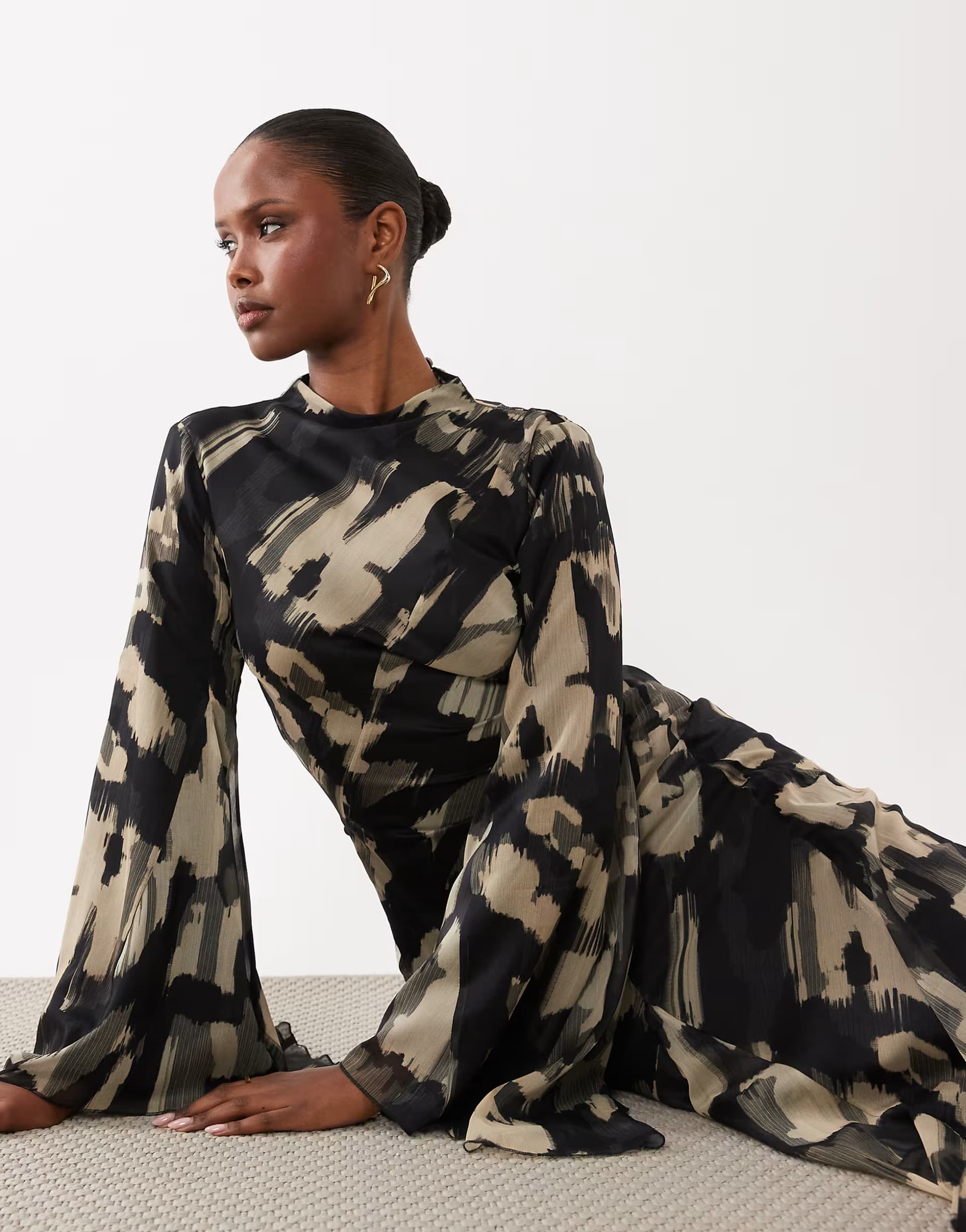 ASOS ASOS DESIGN long sleeve high neck maxi dress with ruffle godets and flute sleeves in mono abstract print