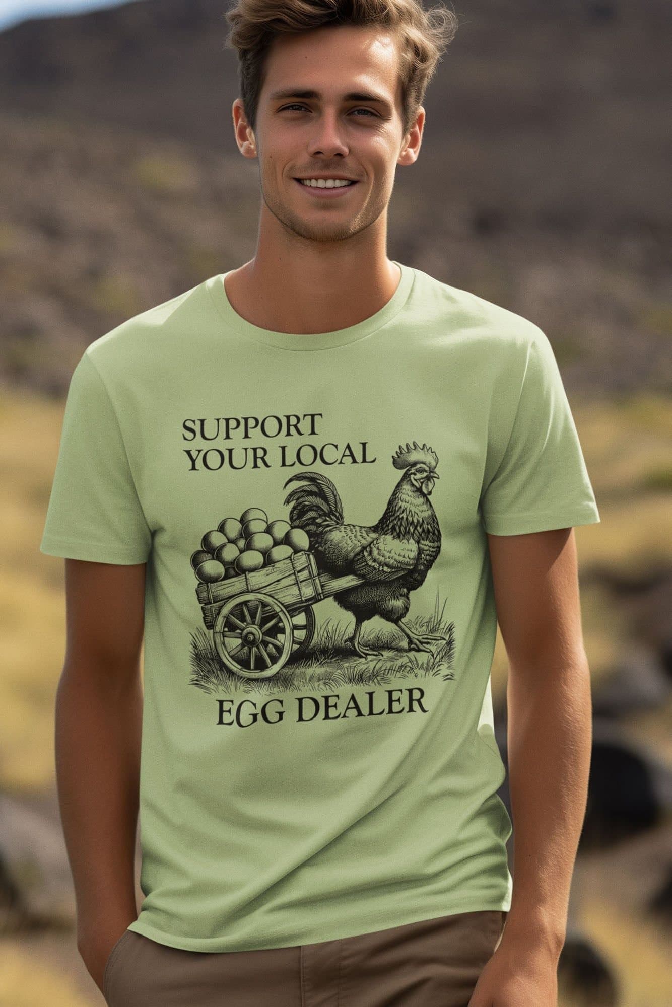 Bad Zebedee Bad Zebedee Men's Support Your Local Egg Dealer Chicken T-Shirt in Light Green