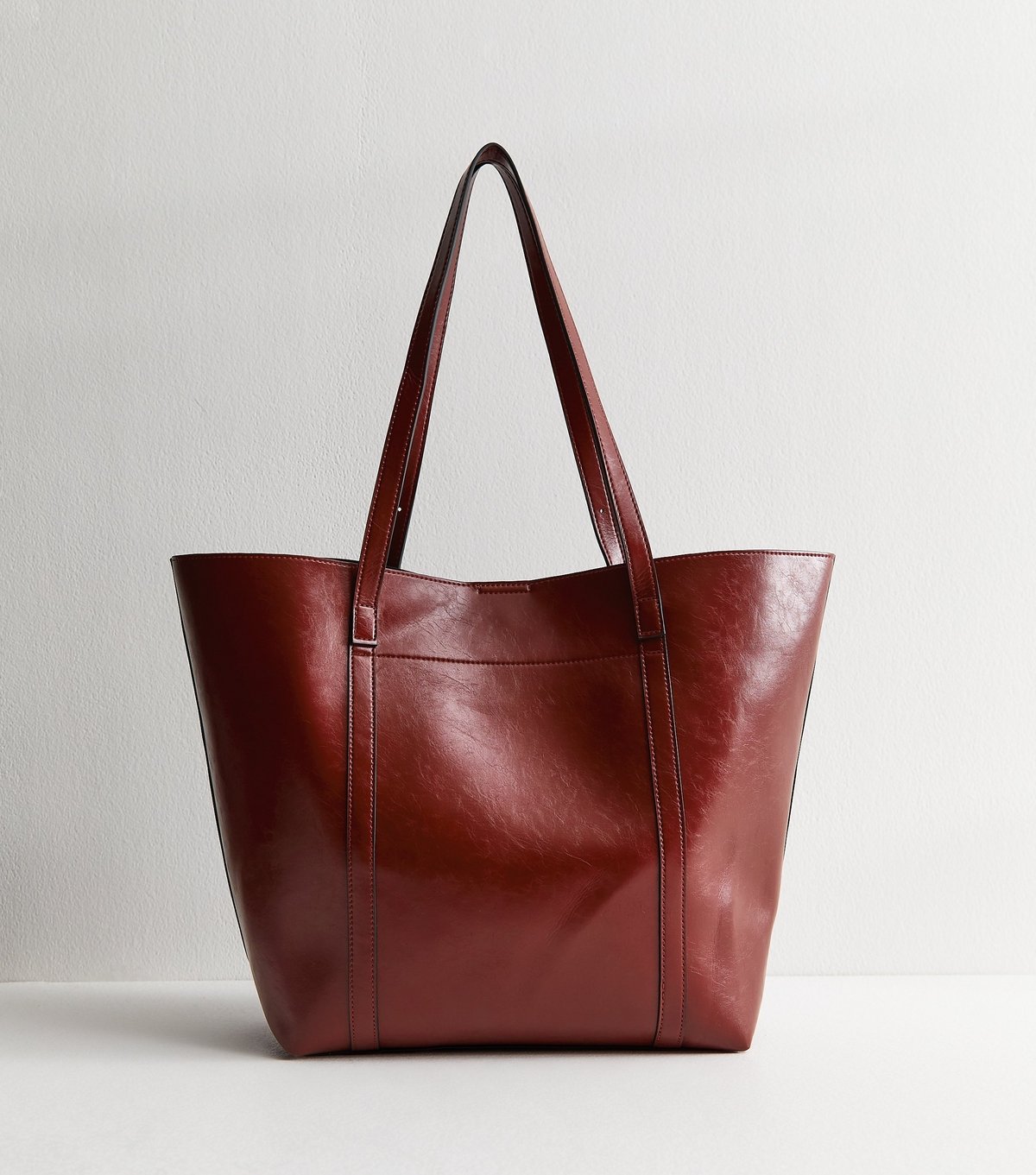 New Look Dark Burgundy Faux Leather Buckled Strap Tote Bag New Look - 4