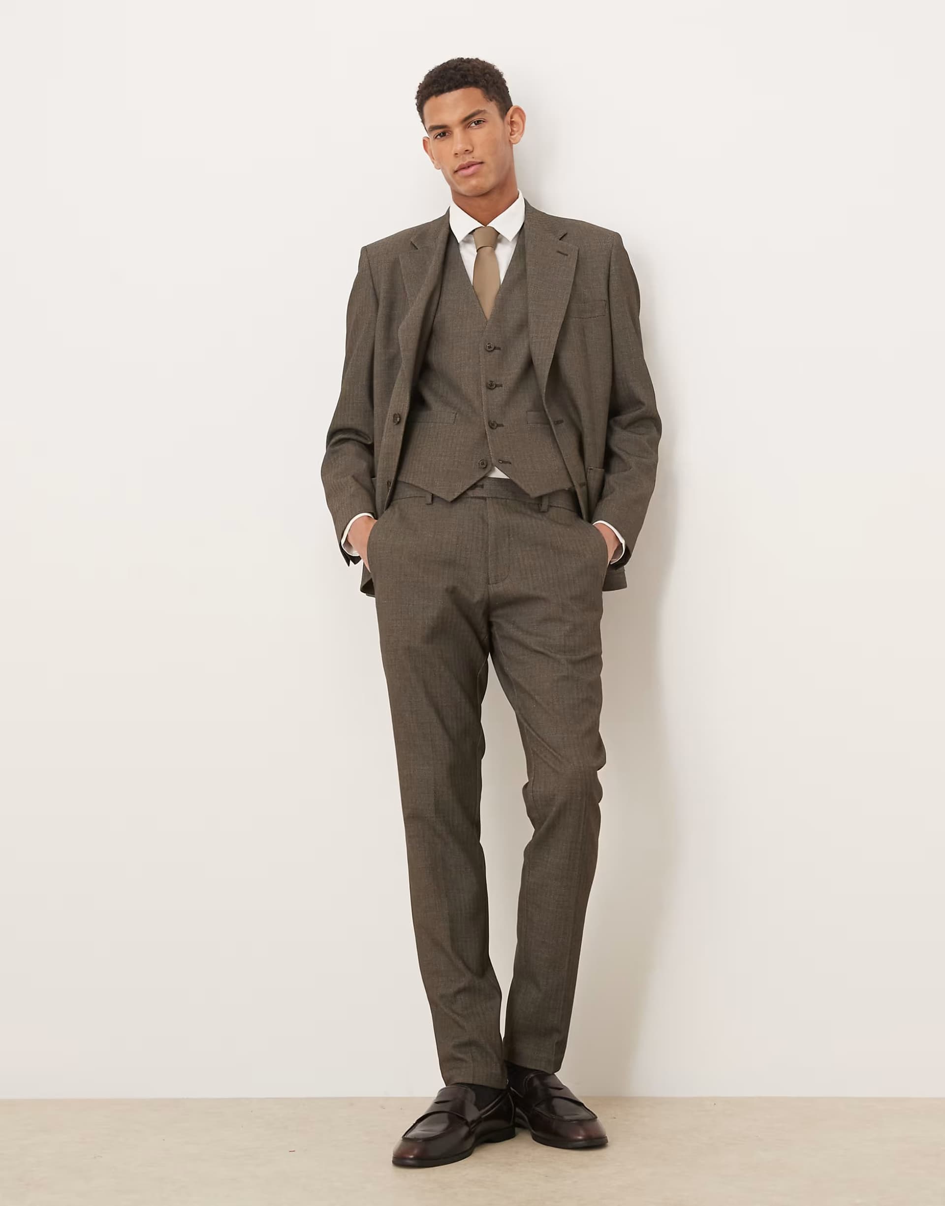 ASOS ASOS DESIGN skinny suit trousers in dark green wool look herringbone