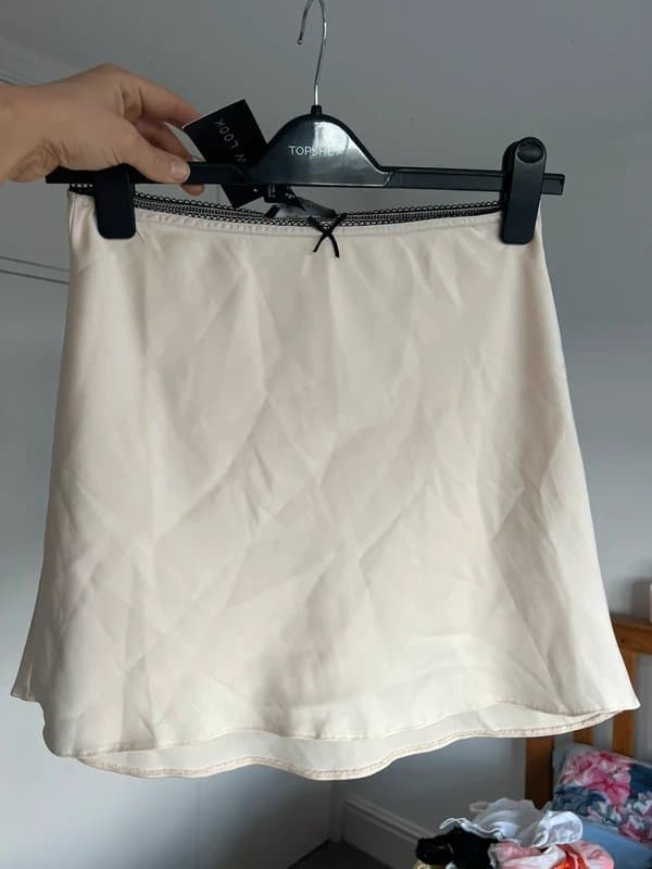 New Look New look BNWT cream and black satin mini skirt with bow detail
