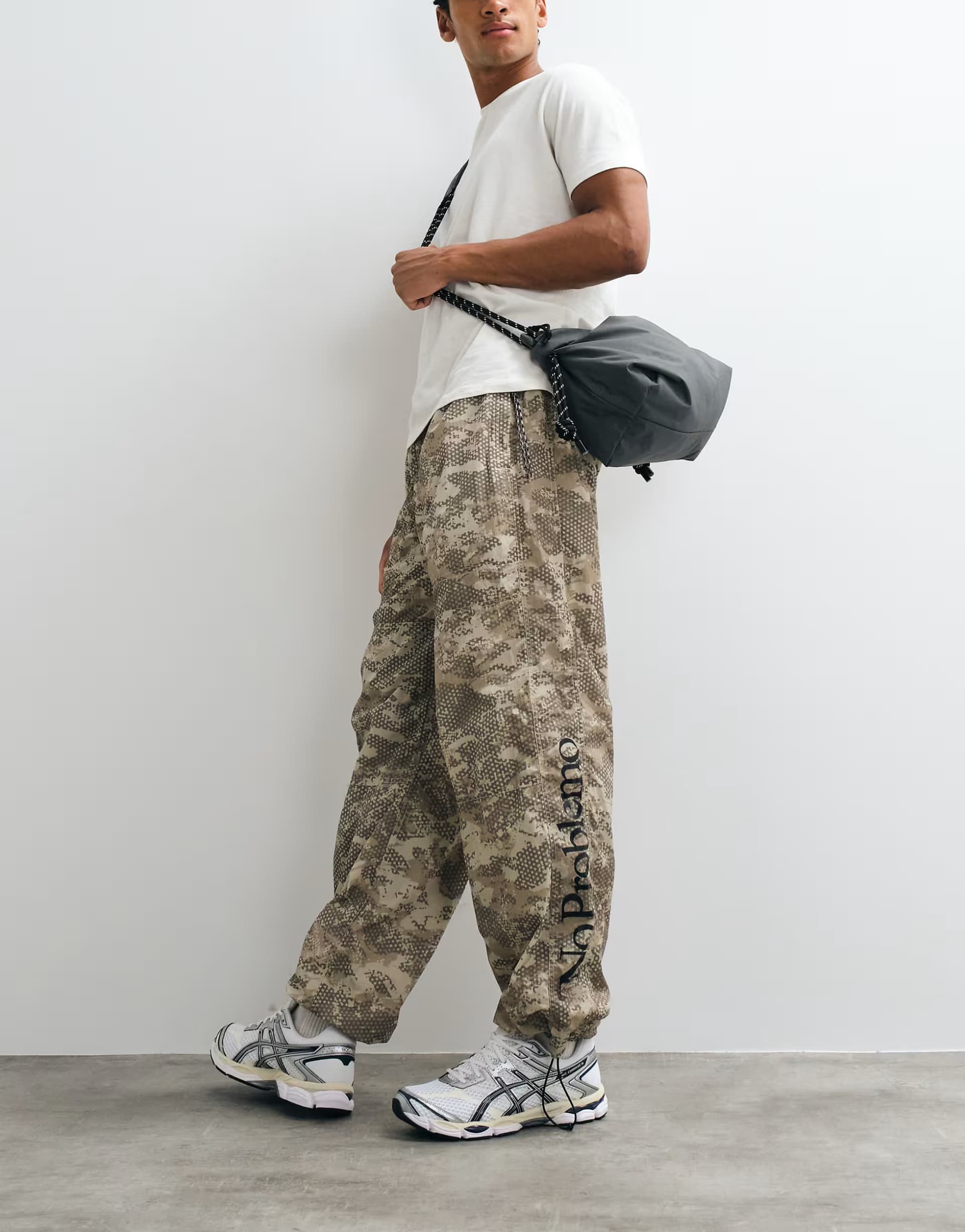 ASOS No Problemo nylon straight leg tree-like printed trousers in sand