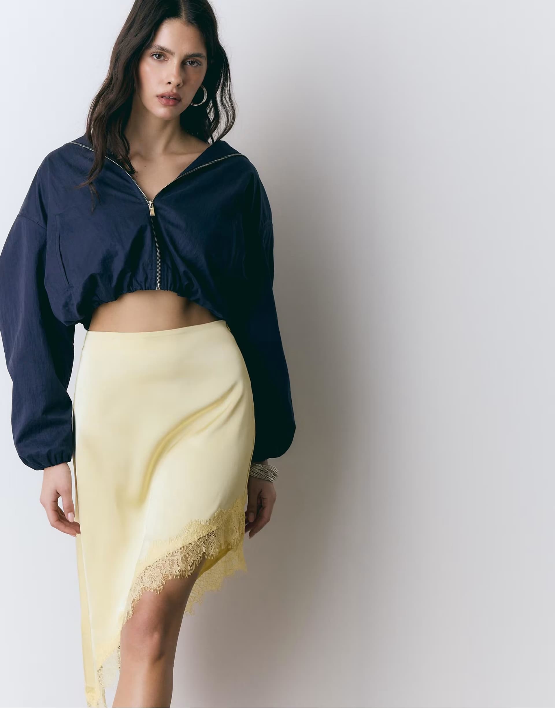 ASOS Stradivarius Satin asymmetric skirt in pastel yellow