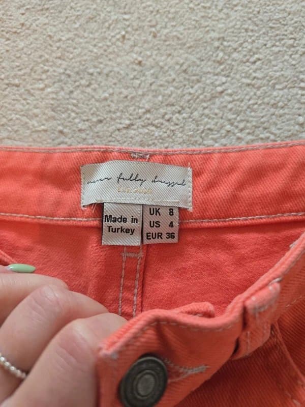 Never Fully Dressed Never fully dressed orange jeans