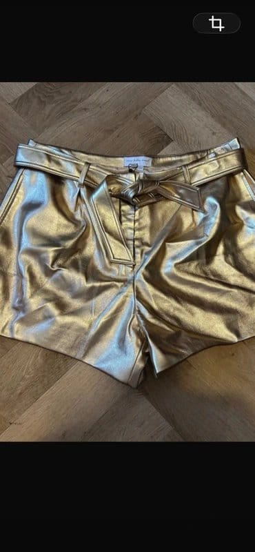 Never Fully Dressed Gold Vegan Leather Shorts