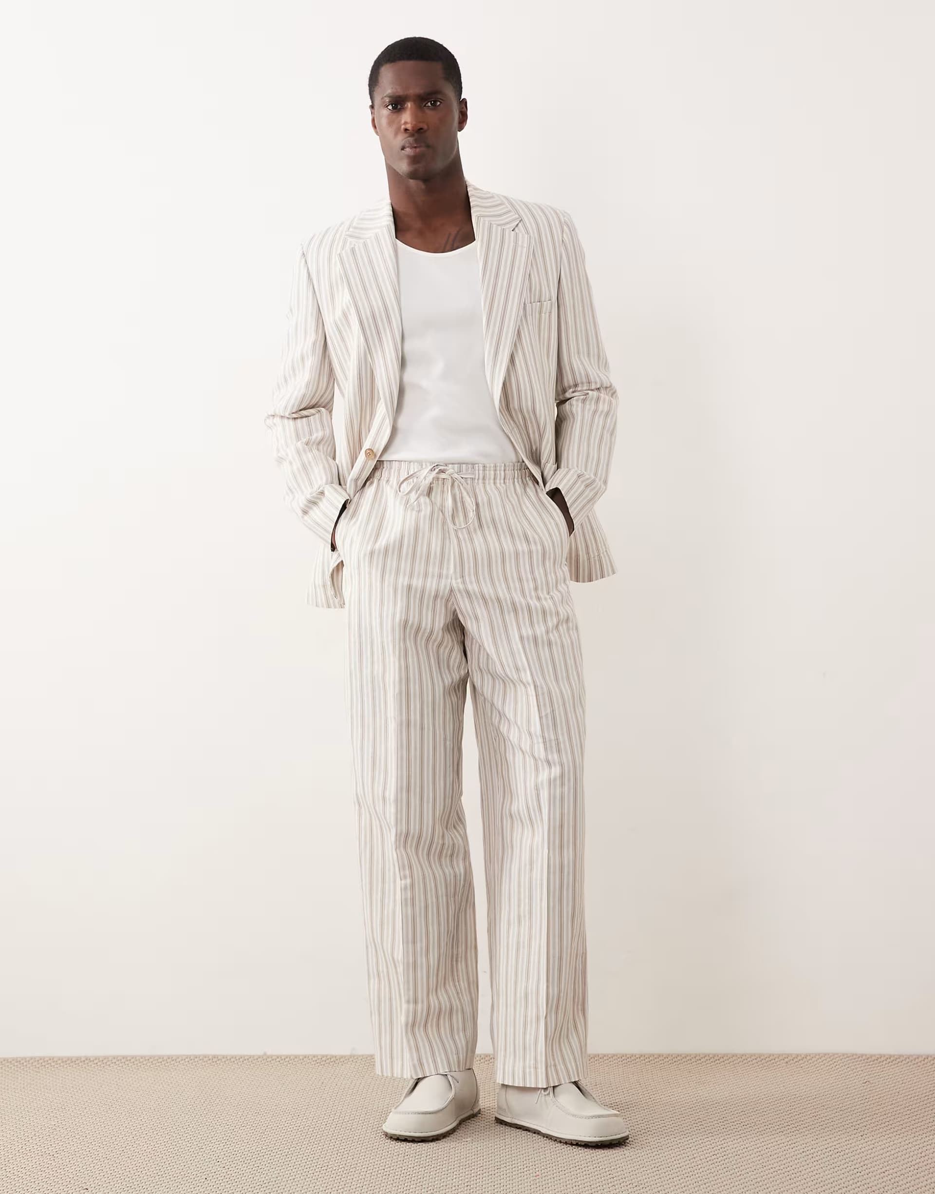 ASOS ASOS DESIGN wide leg linen blend suit trouser with elasticated waist in cream stripe