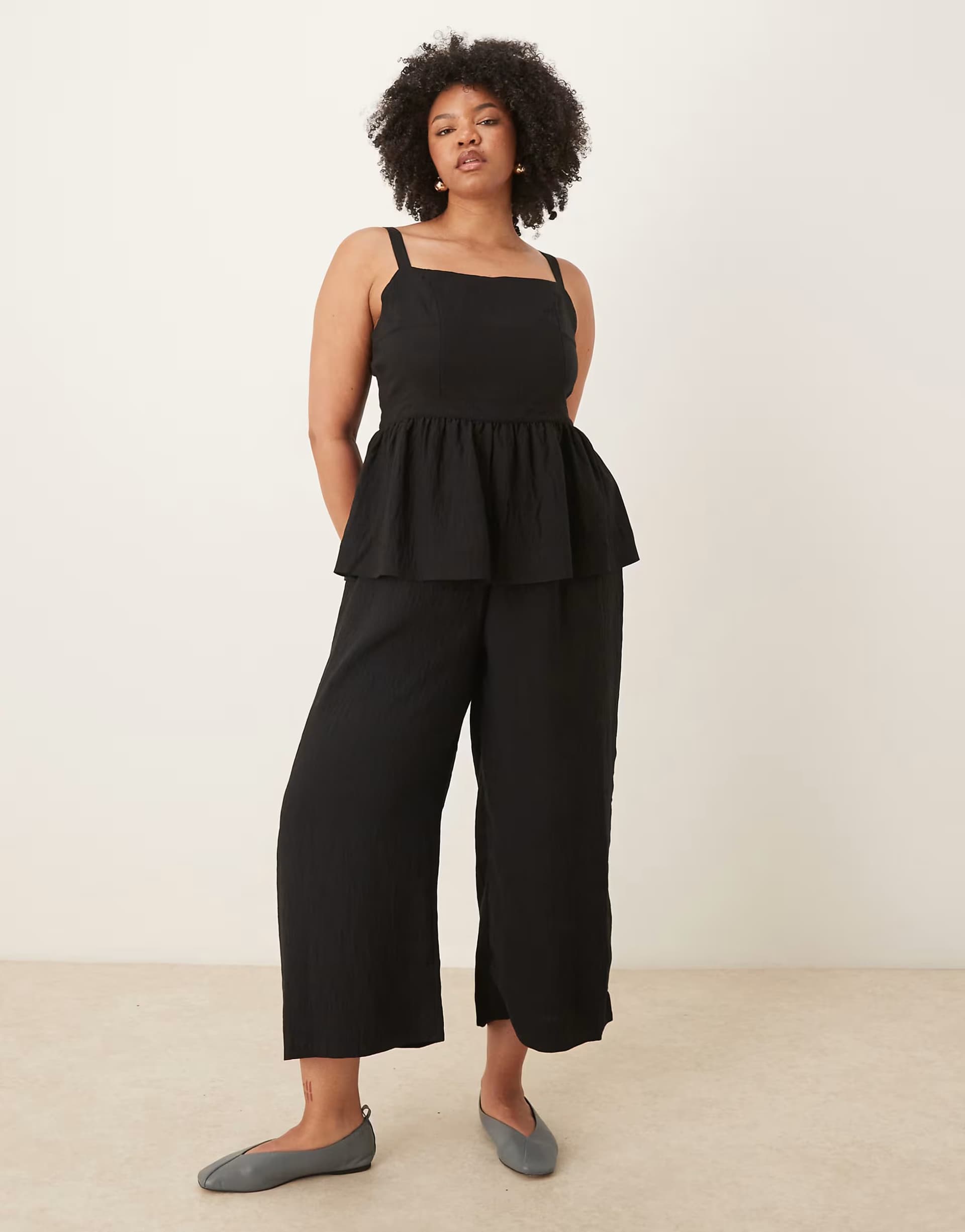 ASOS ASOS DESIGN Curve jumpsuit with peplum waist in black