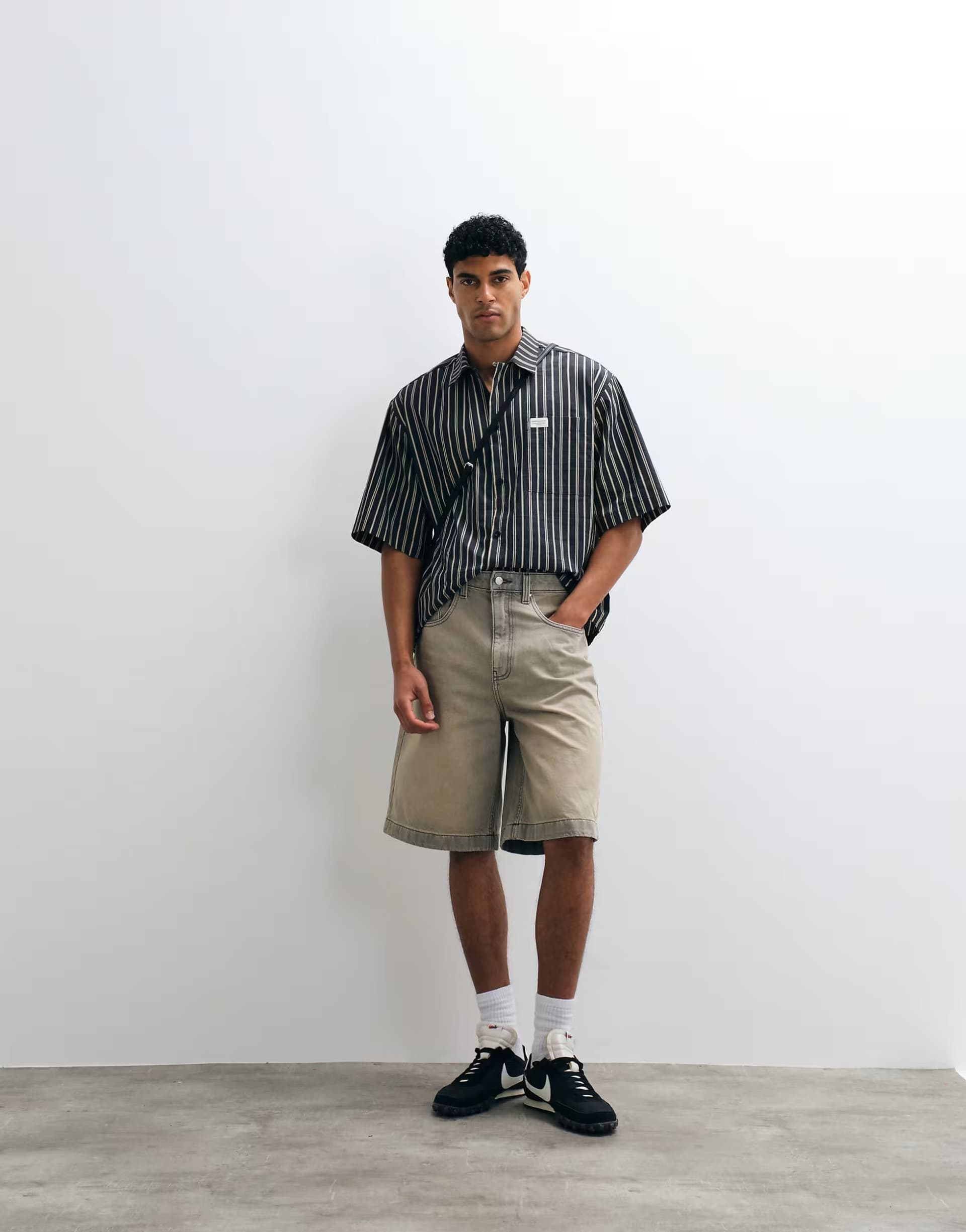 ASOS ASOS DESIGN oversized stripe shirt with placket detail and badge in black