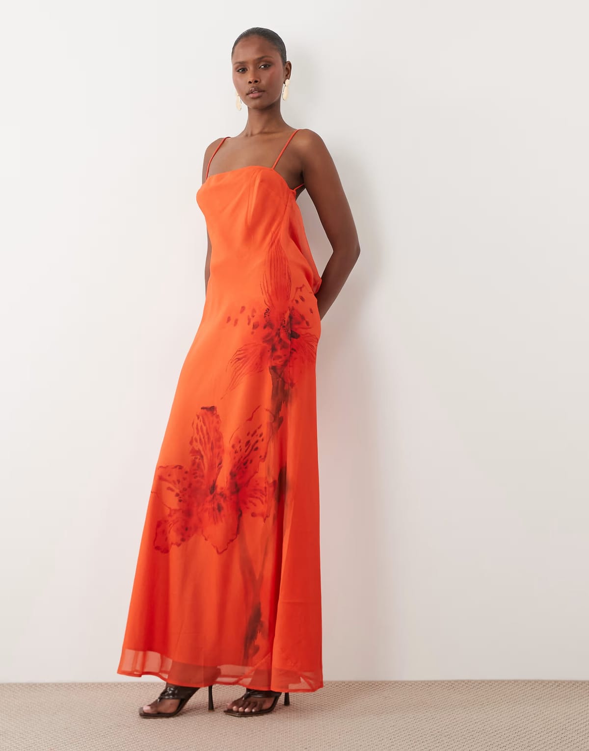 ASOS ASOS DESIGN bias cut column cowl back midi dress with contrast binding in orange placement print - 1