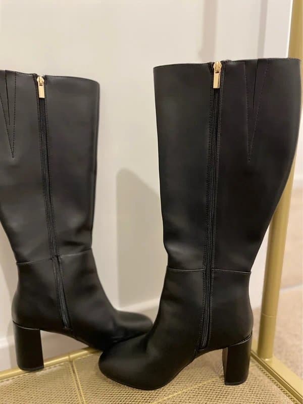 New Look Stylish black knee-high boots with block heels in UK size 4. Minimal wear, only worn briefly.