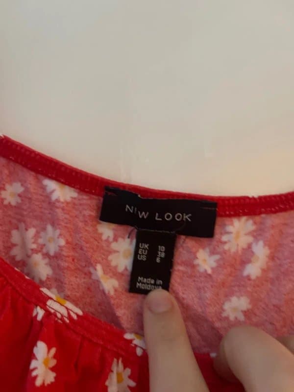 New Look Orange ruched crop top with daisy print