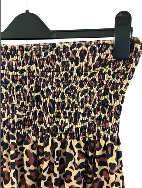 Ideal A woman's animal print strapless beach cover dress. Size S