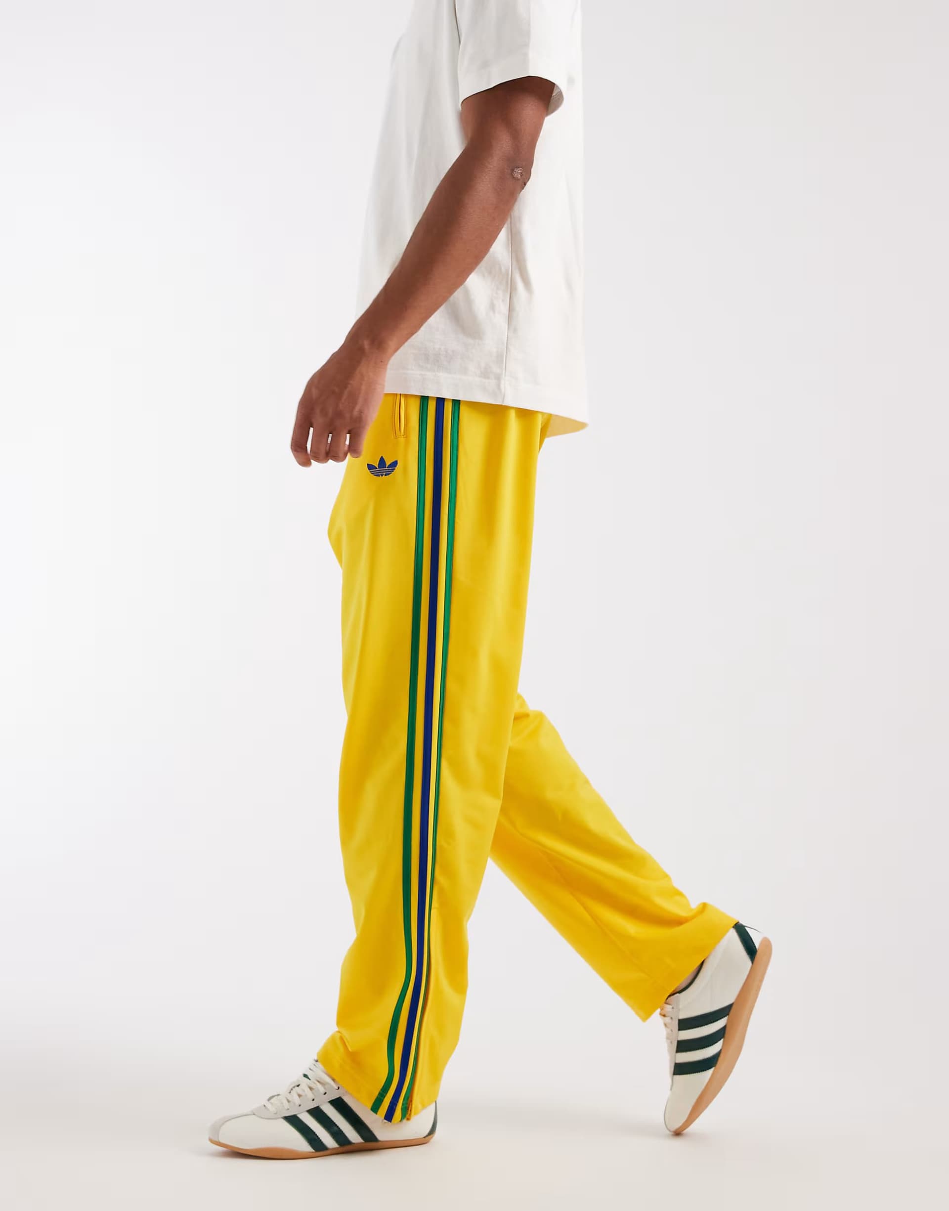 ASOS adidas Originals Firebird track pants in yellow and green