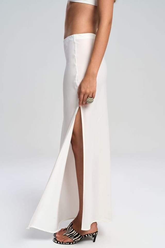 MAI STUDIOS CO. MAI STUDIOS CO. Women's Cecil Slit Detailed Satin Skirt in White - 3