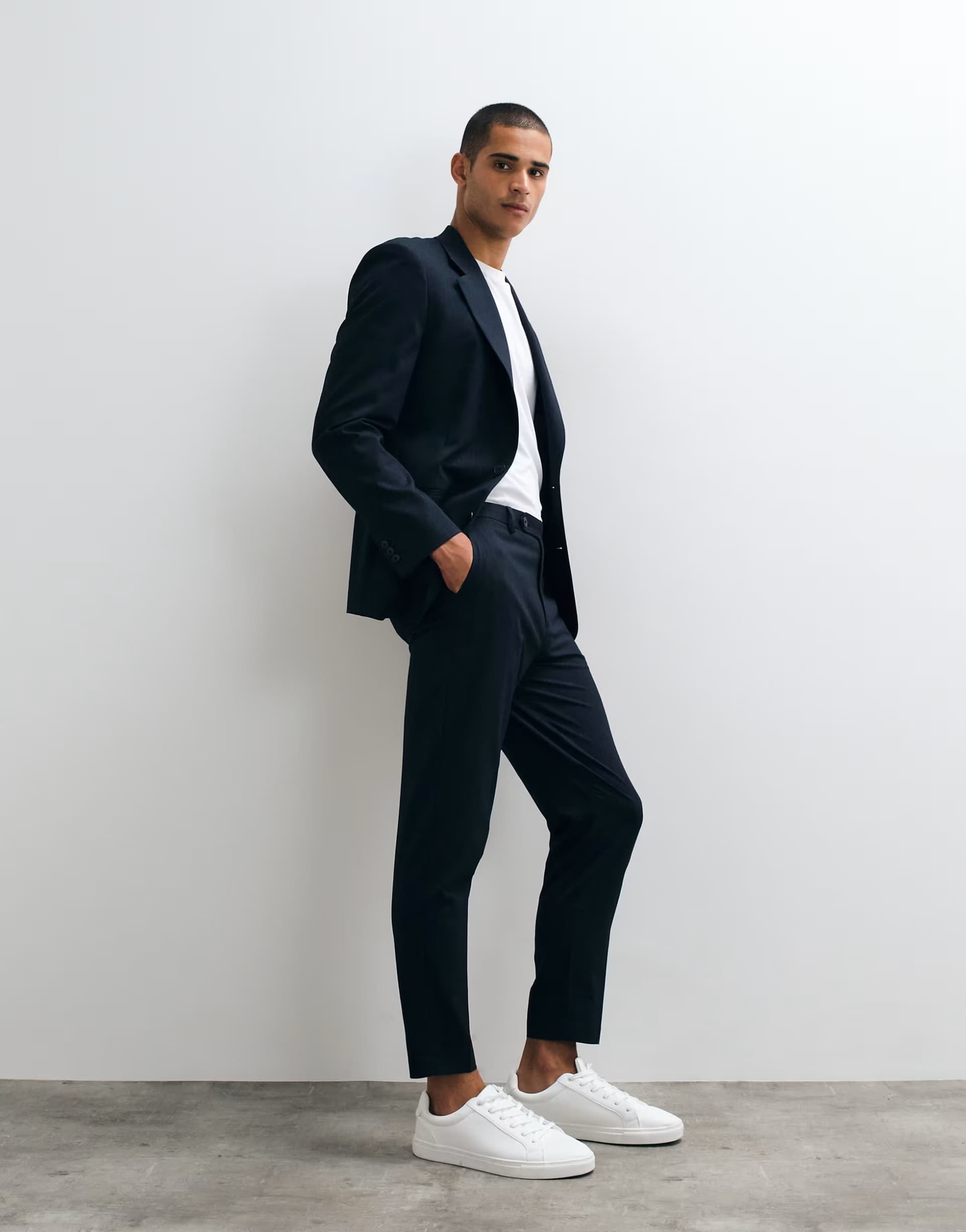 ASOS ASOS DESIGN tapered suit trousers in navy pinstripe