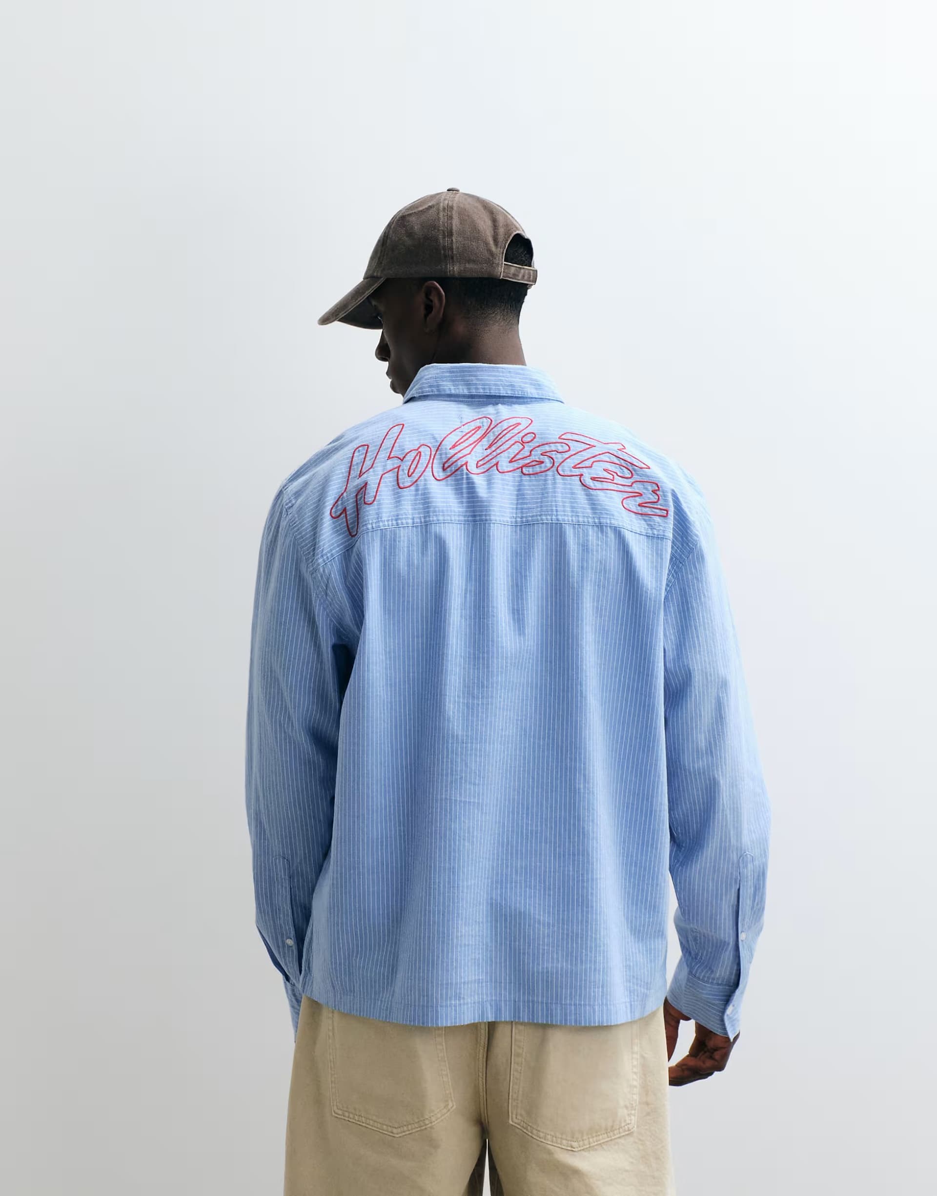 ASOS Hollister embroidered logo long sleeve poplin shirt in blue