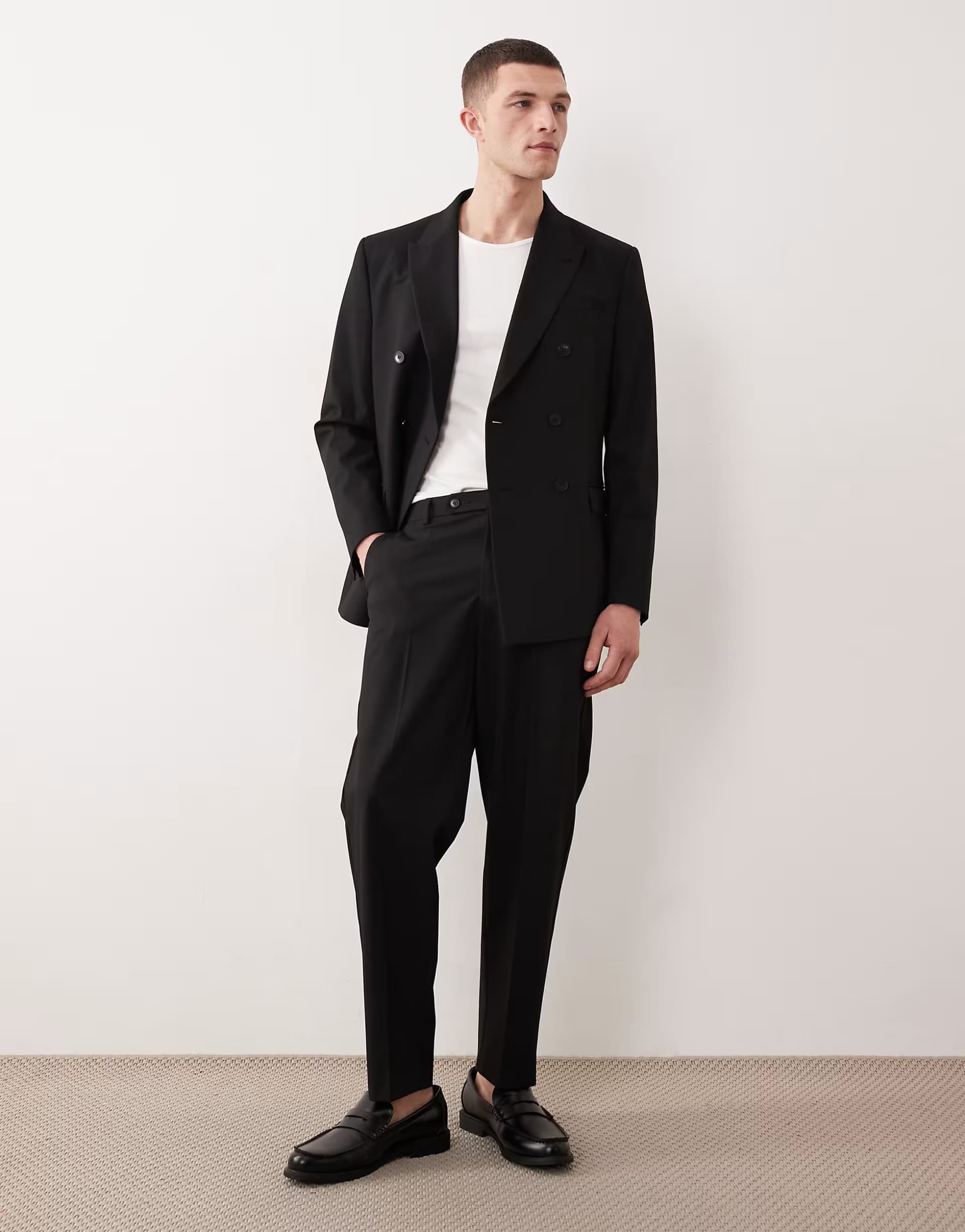 ASOS ASOS DESIGN relaxed tapered suit trousers in black twill