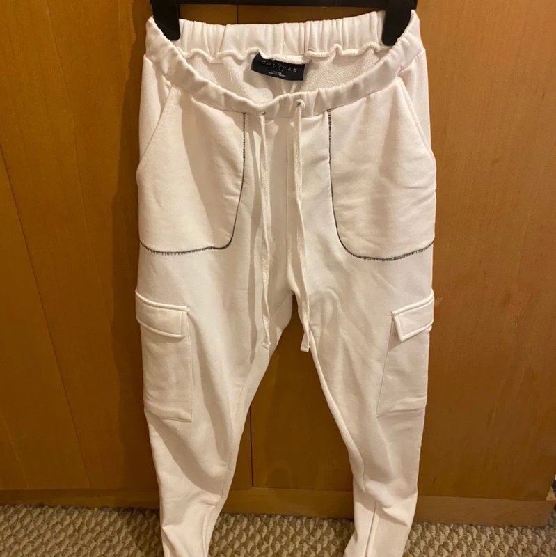 The Couture Club The Couture club slim leg joggers in cream - 1