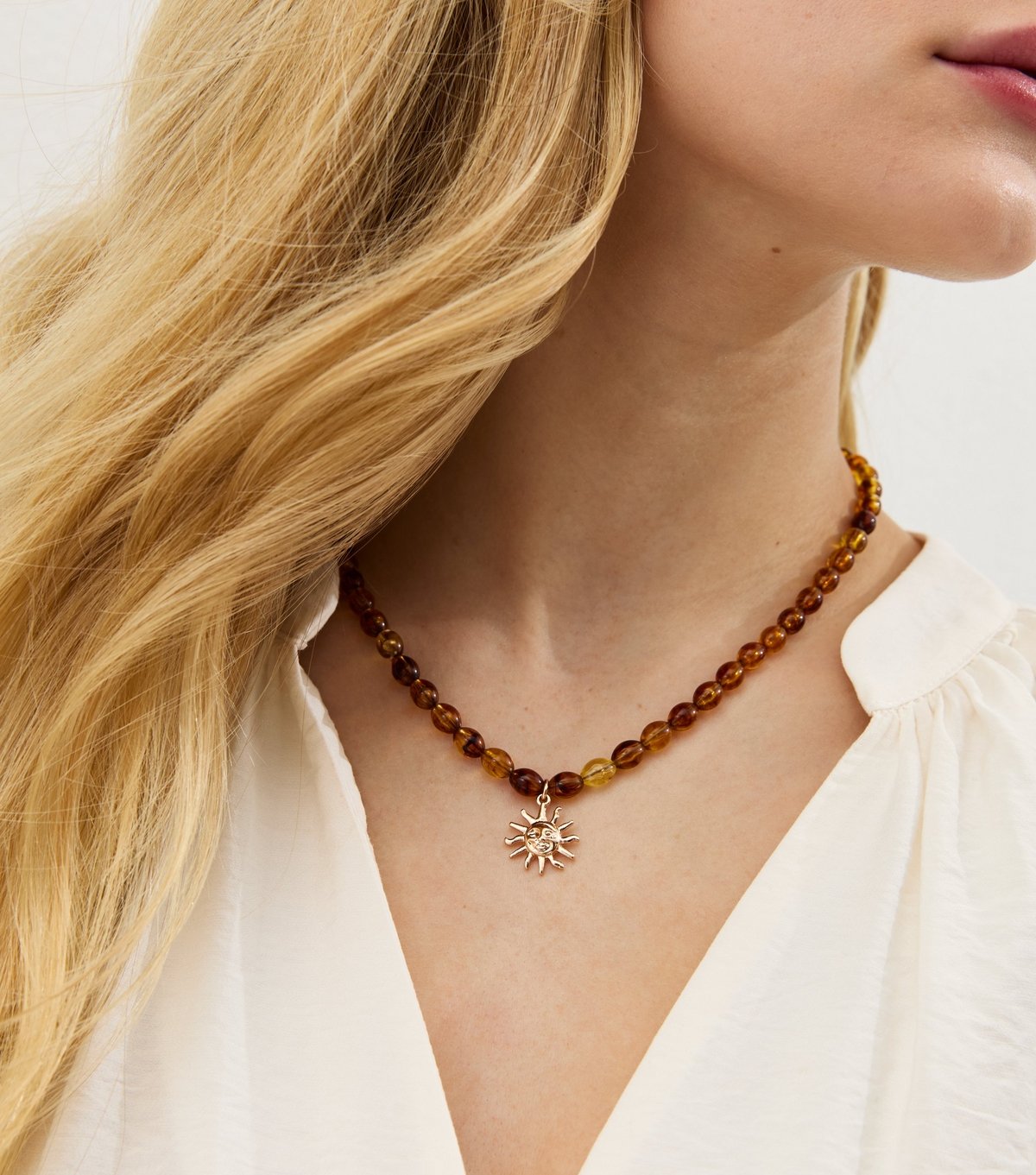 New Look Brown Beaded Sun Pendant Necklace New Look - 1