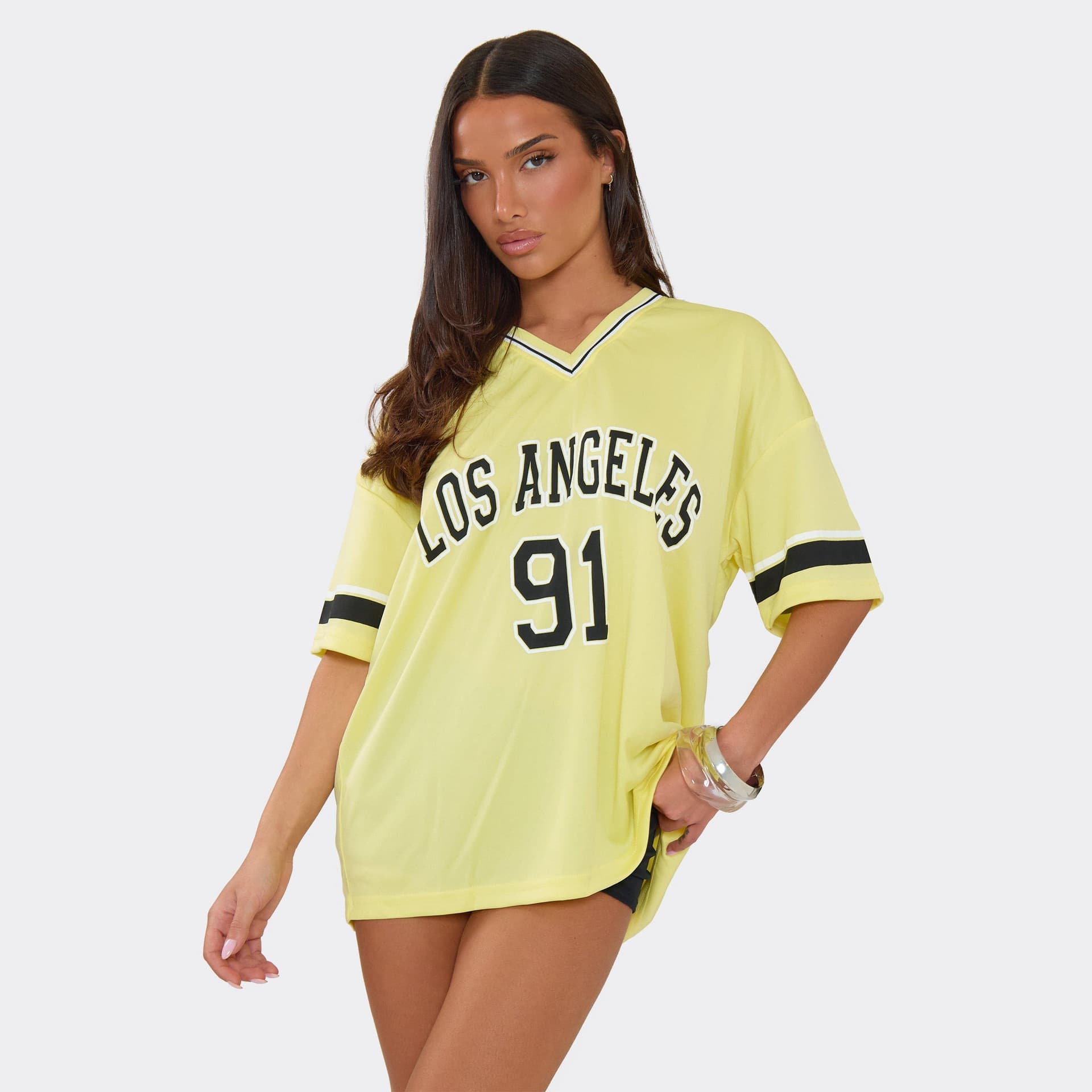 EGO Short Sleeve V Neck Graphic Detail Jersey Top In Yellow, Women's Size UK M/L