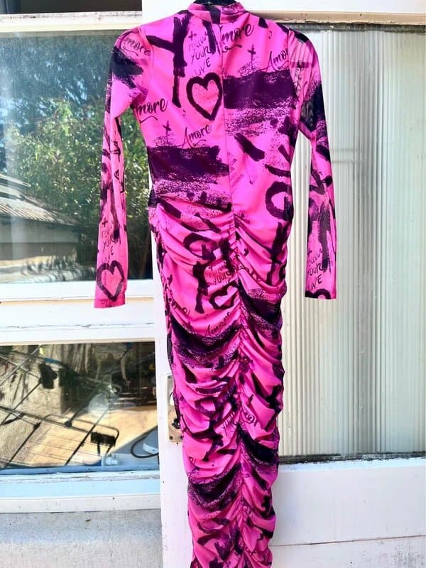 Forever Unique Brand-new, never worn mid length very unique pink spray paint print dress