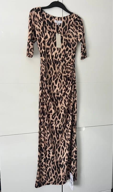 Never Fully Dressed Never fully dressed leopard dress