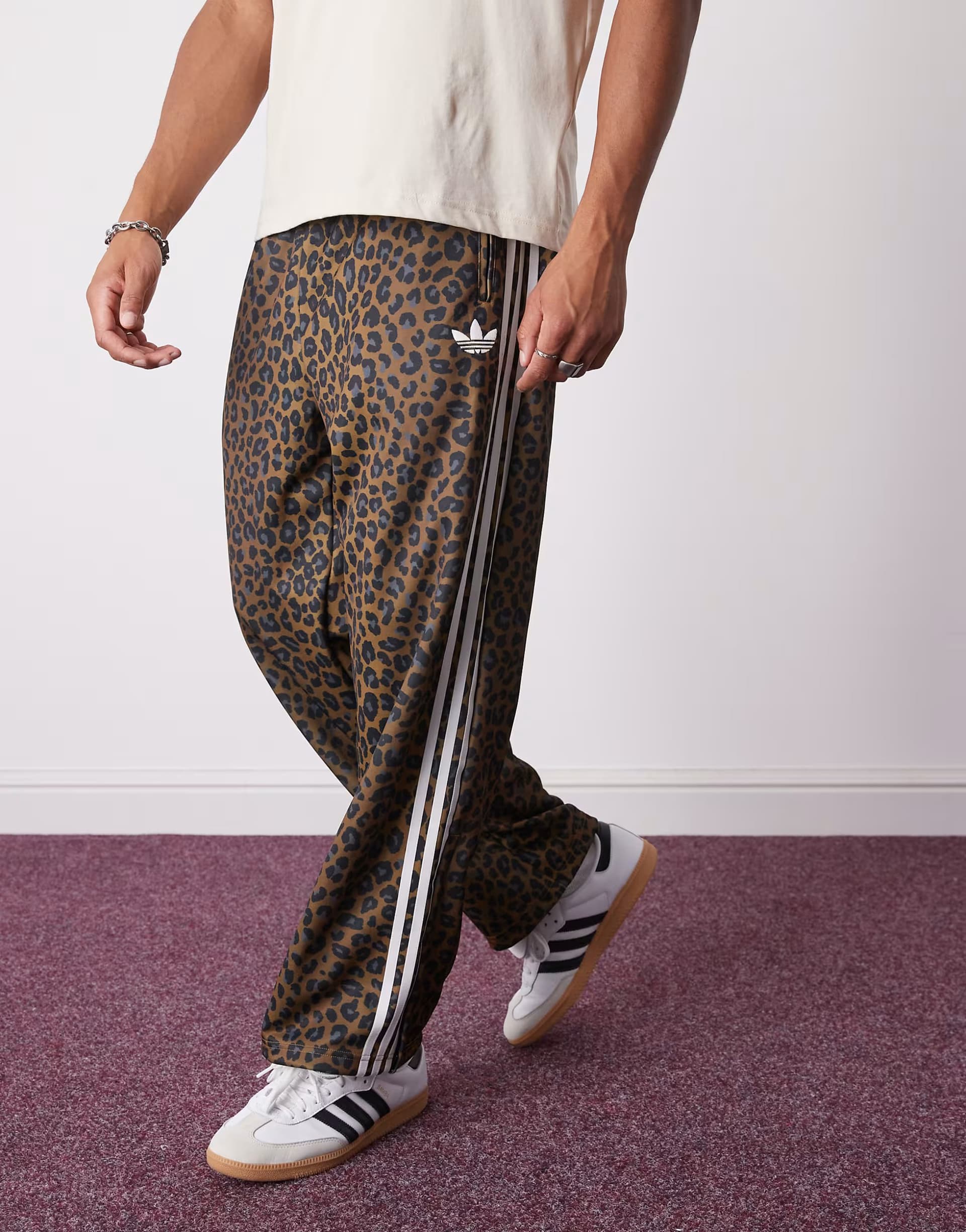 ASOS adidas Originals Firebird loose track pants in leopard print