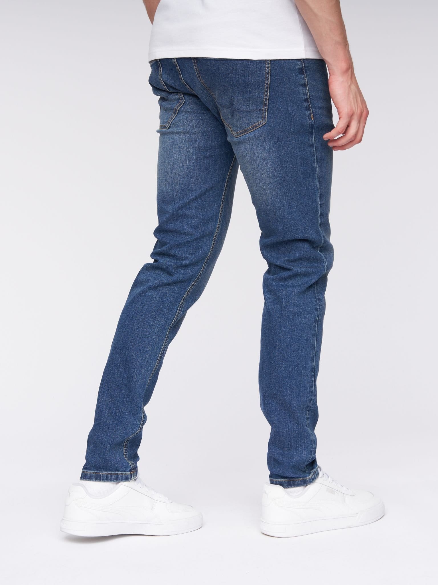 Henleys Henleys Mayhen Men's Skinny-Fit Stretch Denim Jeans with Signature Rubber Label Detail in Mid Blue - 4