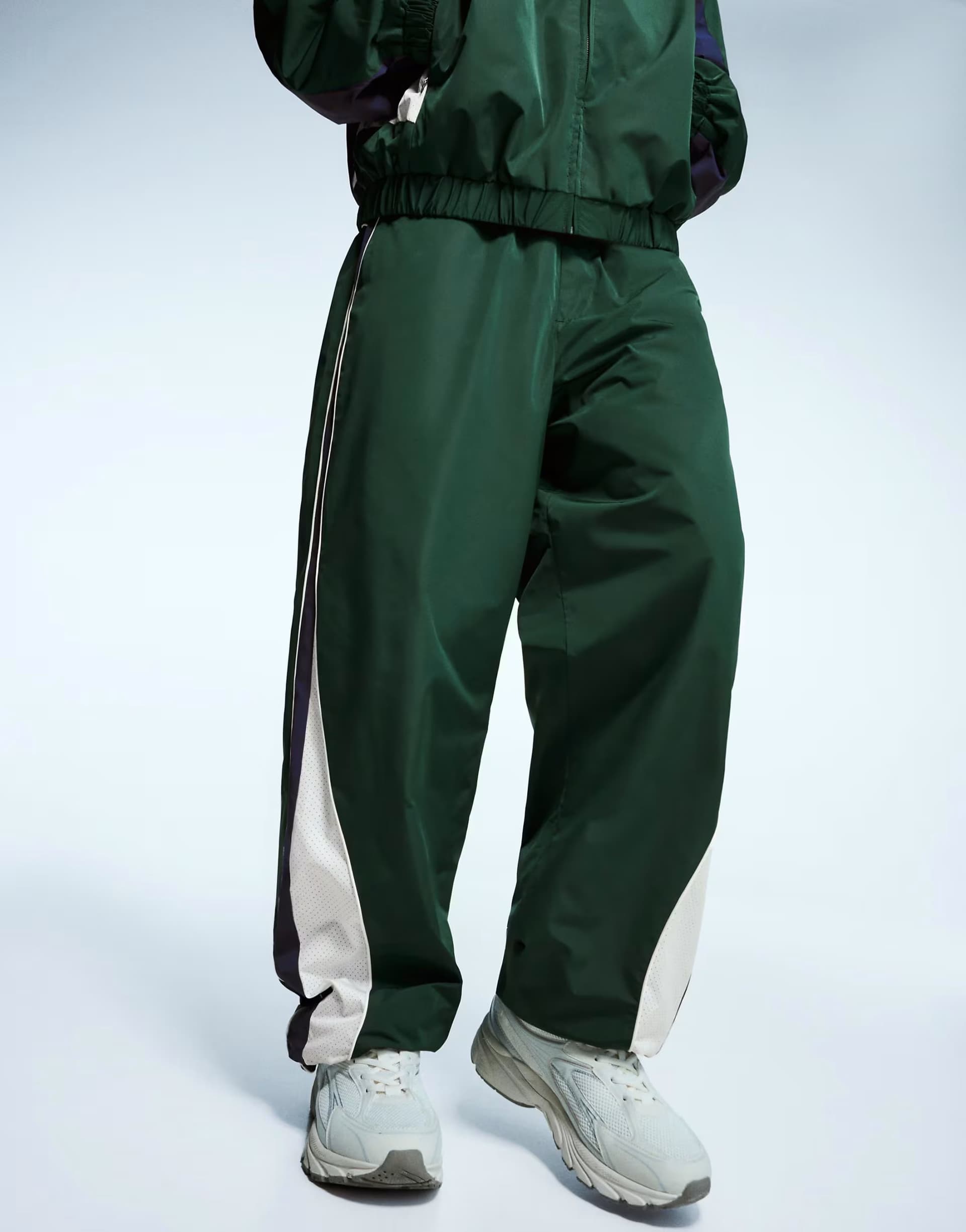 ASOS Bershka Super baggy technical sports trousers in green