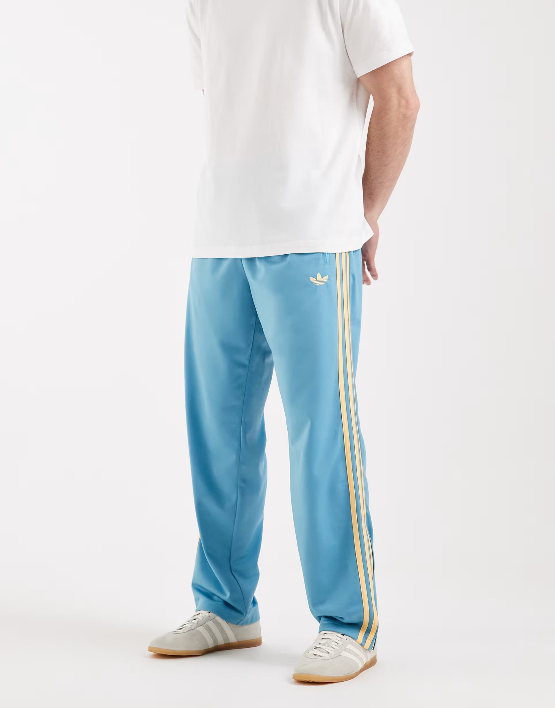 ASOS adidas Originals Firebird track pants in preloved blue and orange