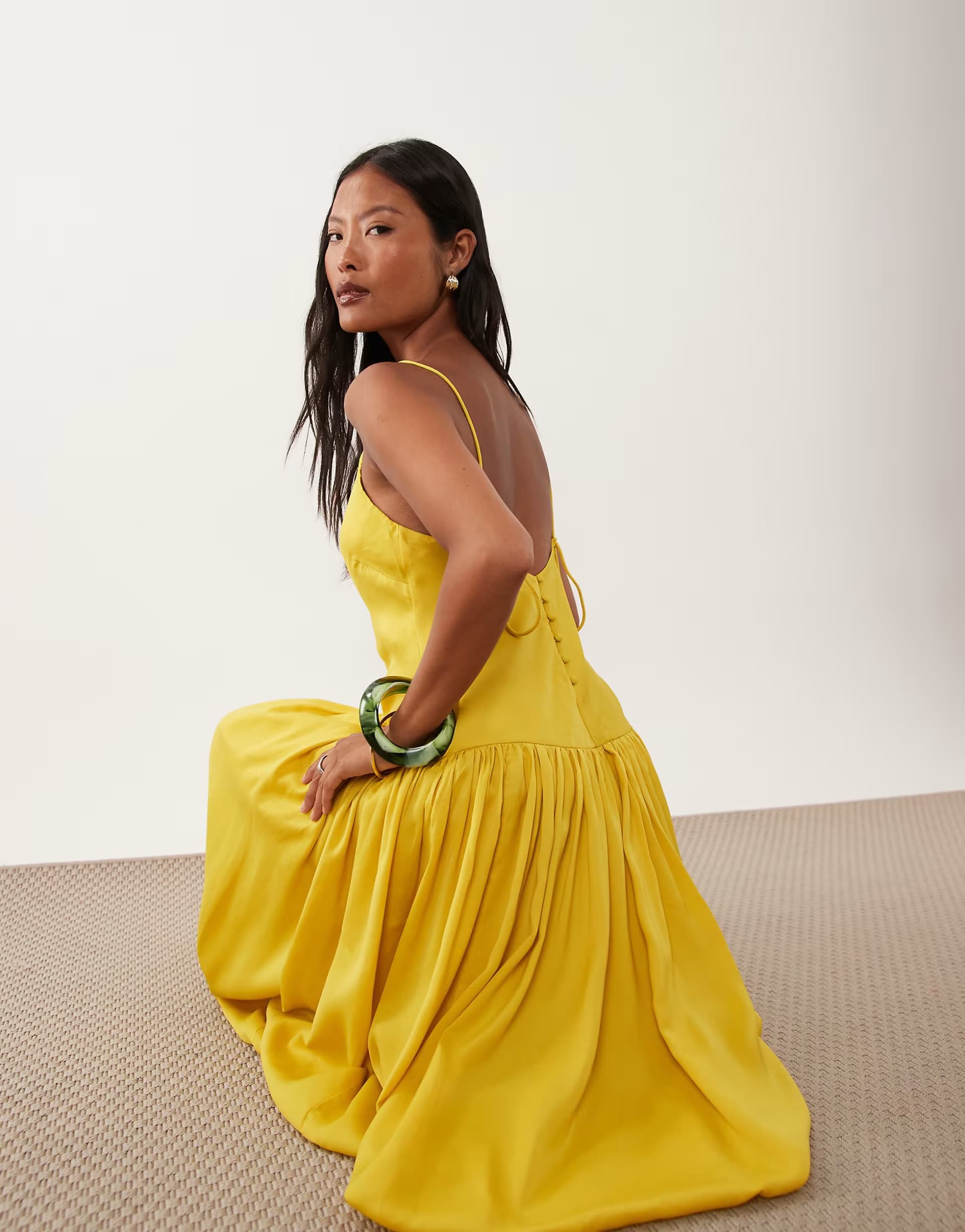 ASOS ASOS DESIGN Petite satin bias shift dress with bubble hem in yellow