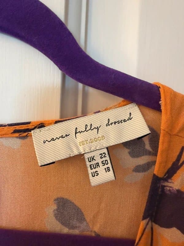 Never Fully Dressed Never fully dressed size 22 orange purple dress