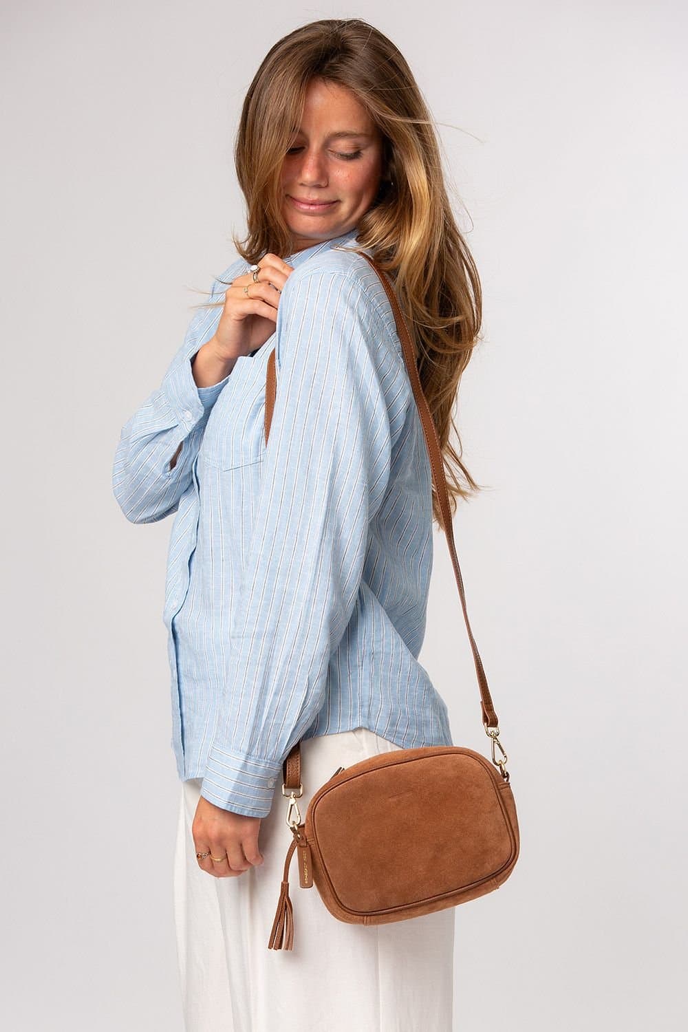 Pure Luxuries London Pure Luxuries London Women's 'Fable' Suede Cross Body Bag in Tan