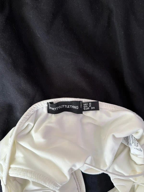 PrettyLittleThing White backless strap bodysuit