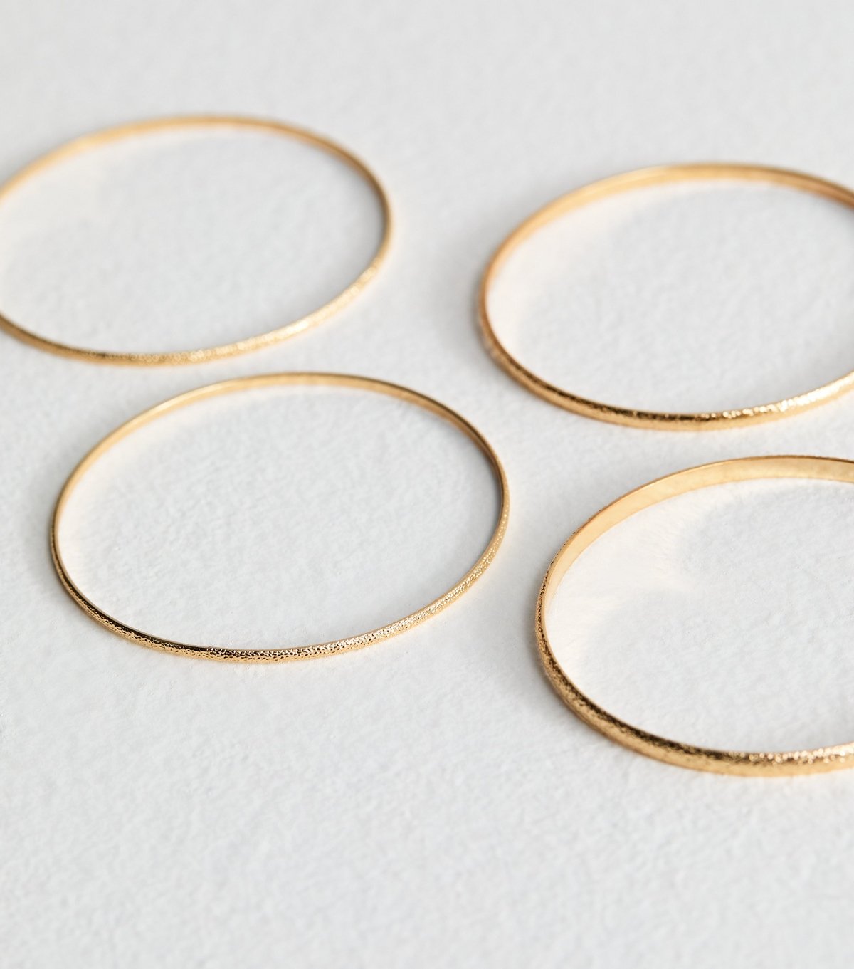 New Look Pack of 4 Gold Tone Textured Bangles New Look - 4