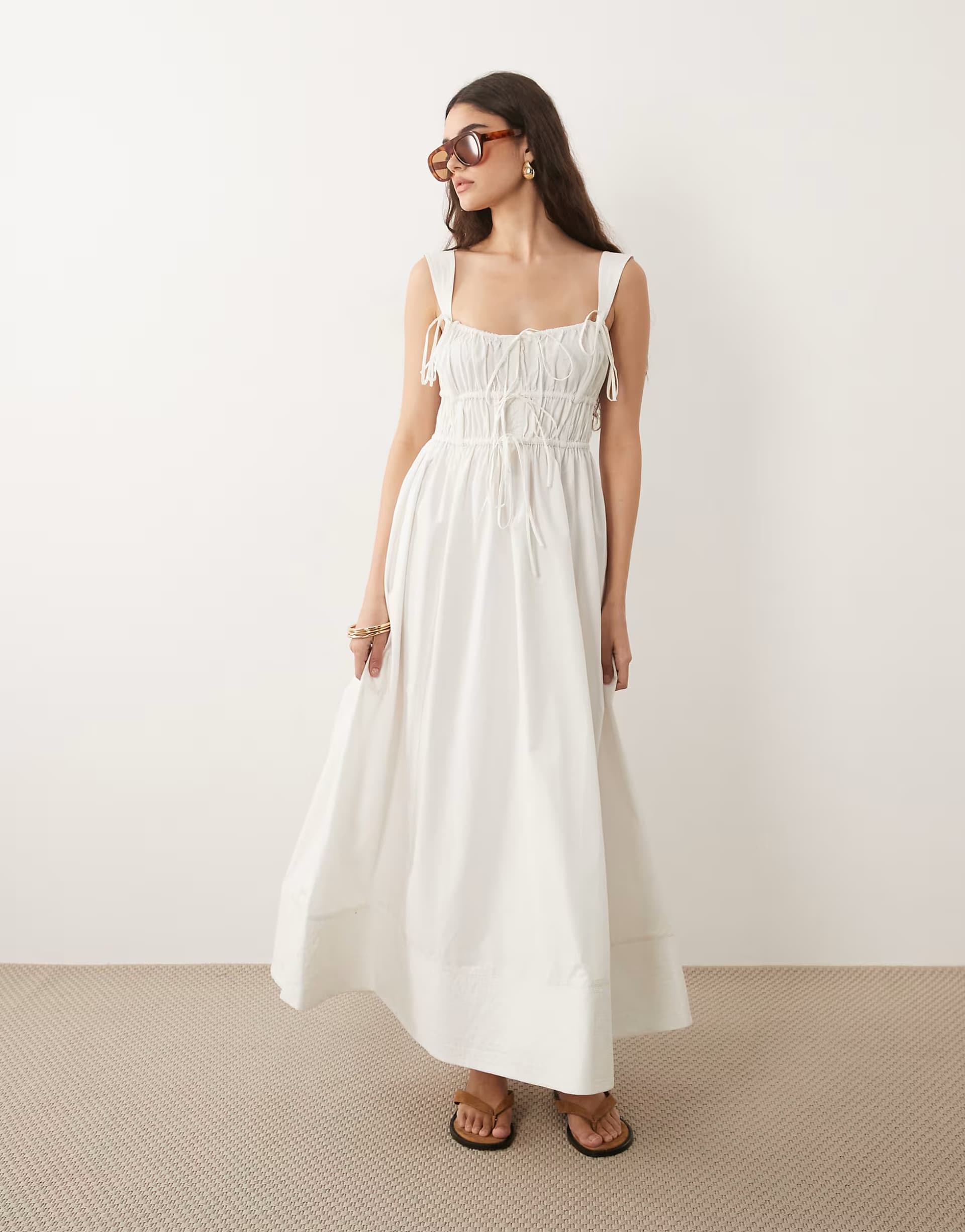 ASOS ASOS DESIGN ruched bodice maxi sundress with full skirt and multi stitched hem in white 