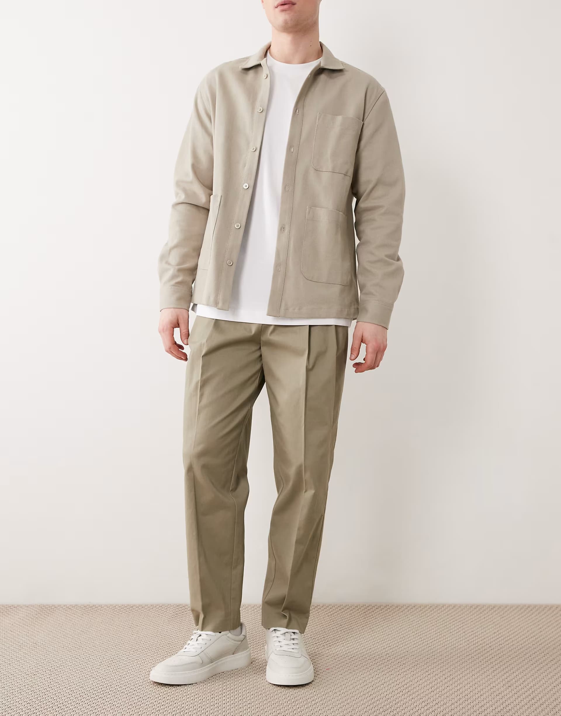 ASOS ASOS DESIGN smart cotton rich relaxed tapered chino trousers in khaki with front pleats