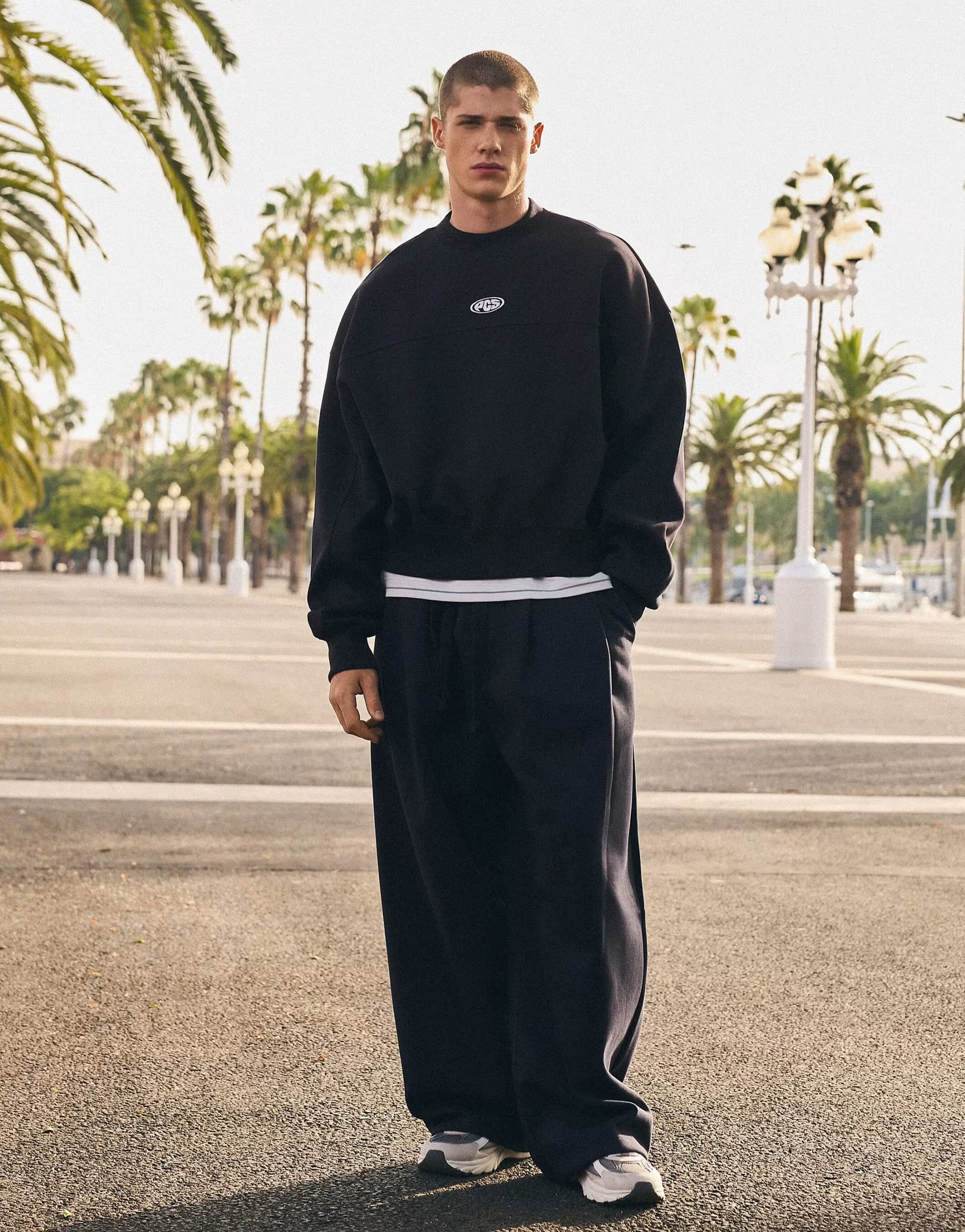 ASOS Bershka Bonded pleated volume jogger trousers in blue