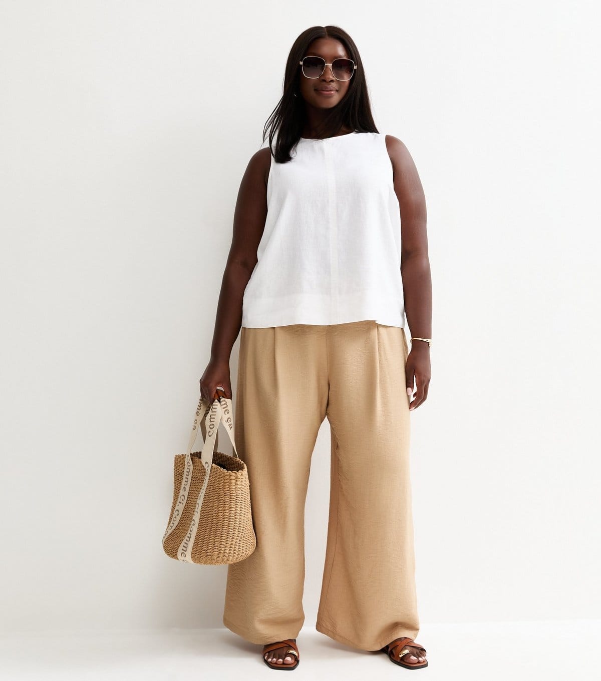 New Look Stone Crinkle Texture Plus Size Pull On Wide Leg Trousers