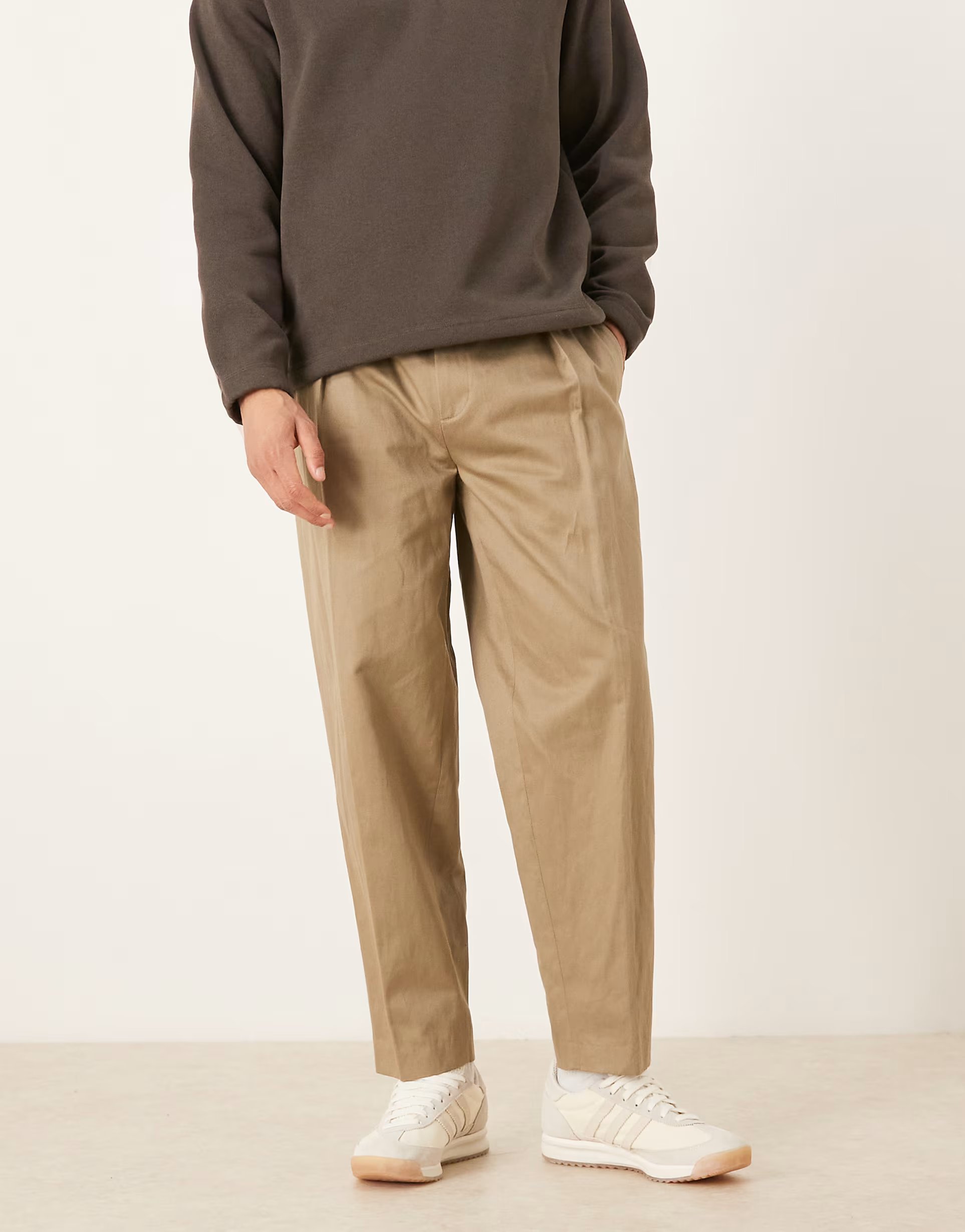 ASOS ASOS DESIGN smart pleated premium linen blend oversized tapered trousers in khaki - 1