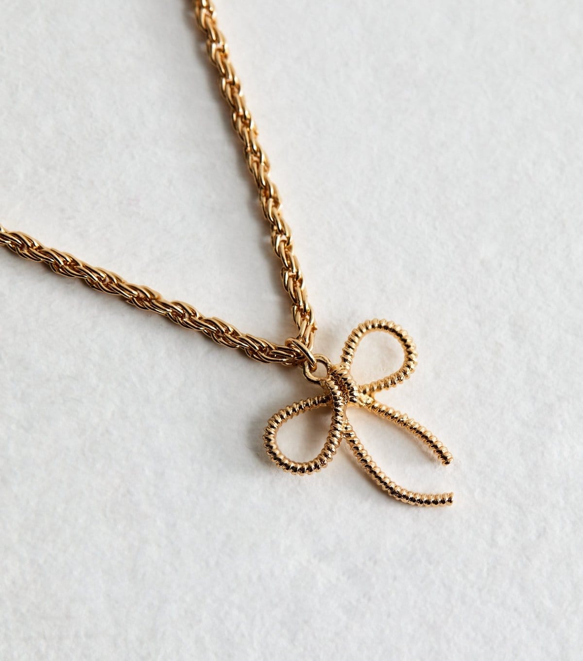 New Look Gold Tone Rope Chain Bow Charm Necklace New Look - 4