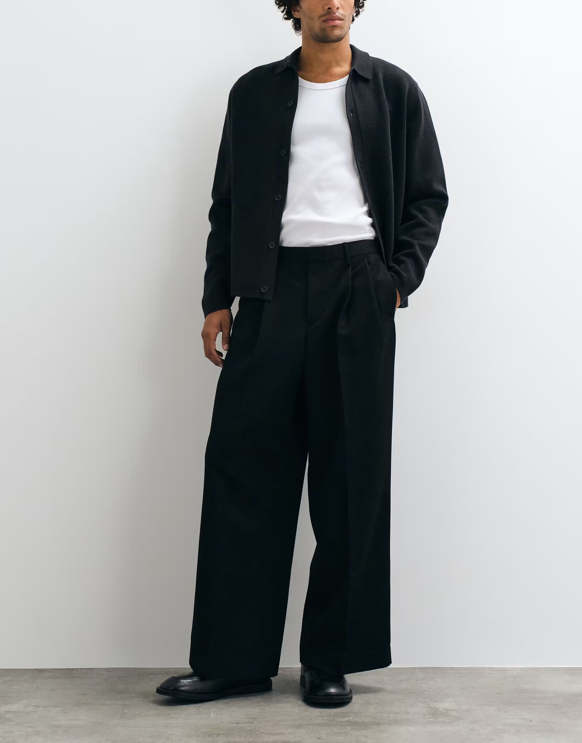 ASOS ASOS DESIGN tailored double pleated loose leg trousers in black