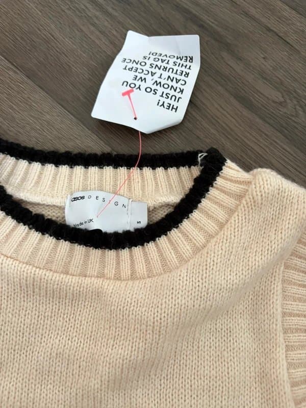 ASOS Design Cream sweater vest with black stitching