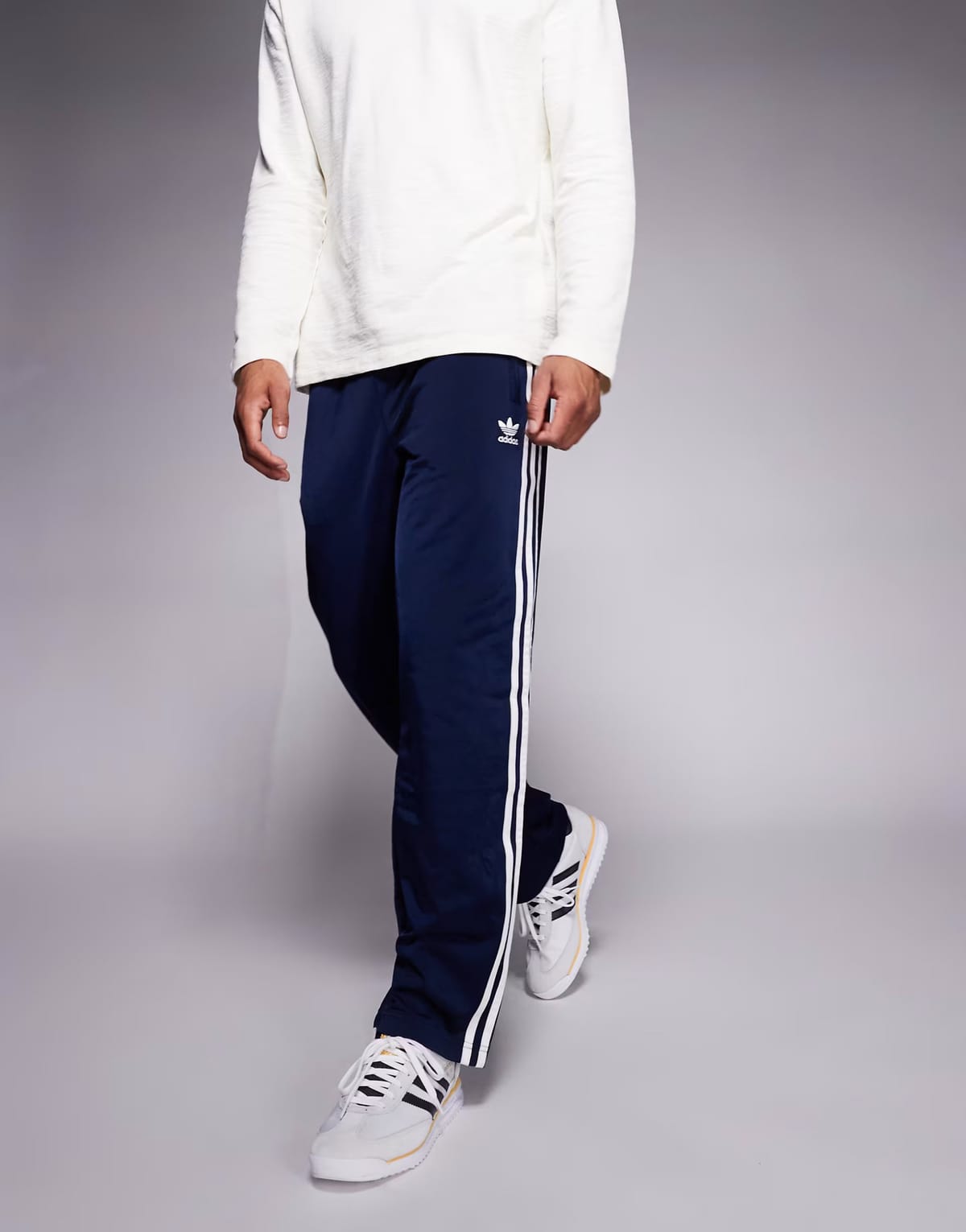 ASOS adidas Originals Firebird track pants in navy - 1